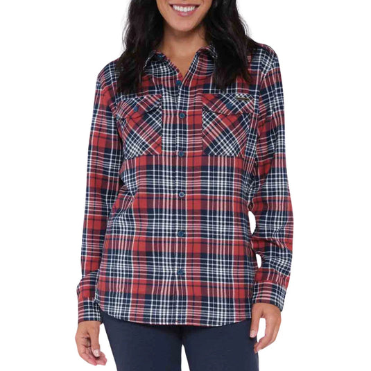Woman wearing a red and navy blue plaid shirt on a white background