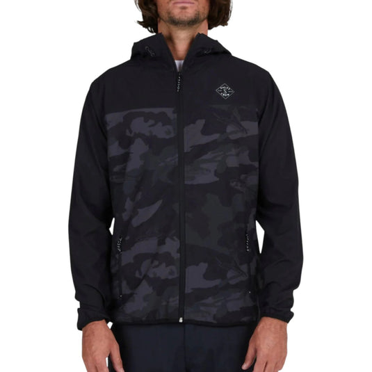 Black camouflage jacket worn by a person on a white background