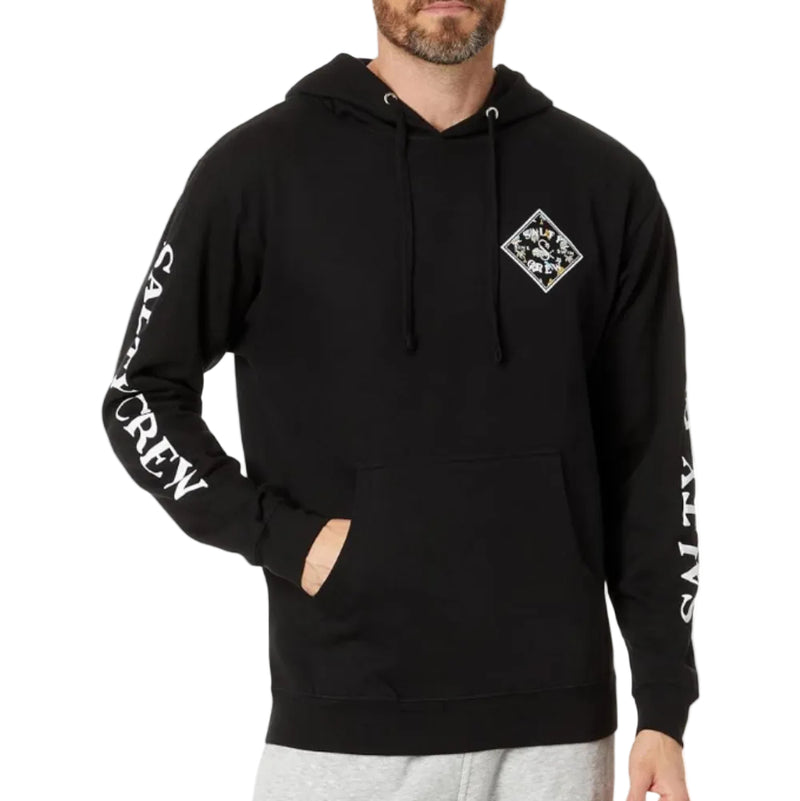 Load image into Gallery viewer, Man wearing a black hoodie with Salty Crew branding on sleeves and chest, standing against a white background
