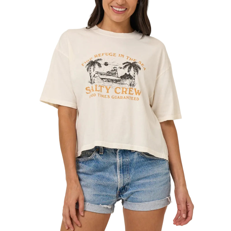 Load image into Gallery viewer, Woman wearing a Salty Crew t-shirt and denim shorts on a plain background
