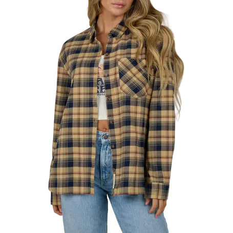 Load image into Gallery viewer, Woman wearing a khaki plaid shirt and jeans on a gray background
