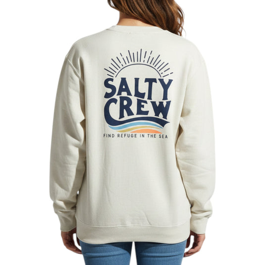 Beige sweatshirt with 'Salty Crew' logo on the back, worn by a person.