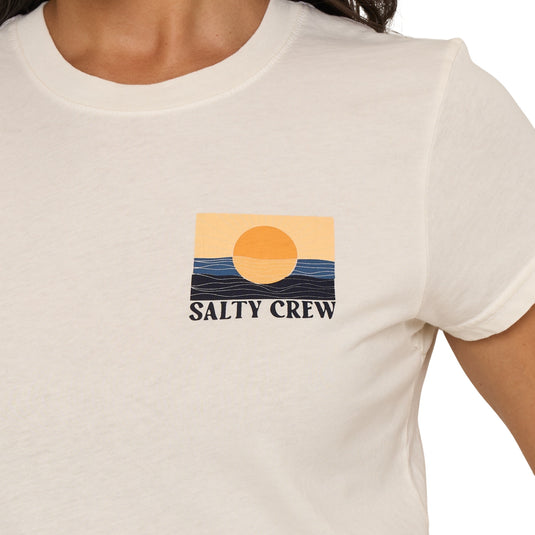 Salty Crew women's off white t-shirt that is slightly fitted with cap sleeves, featuring a retro wave logo on the front left chest.