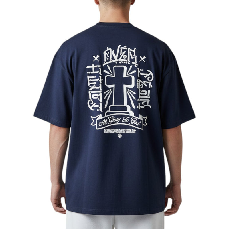 Load image into Gallery viewer, Navy blue t-shirt with white graphic design on the back, worn by a person.
