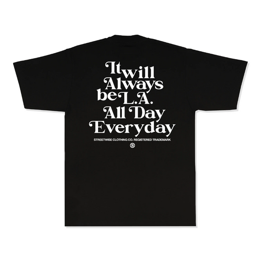 A black short-sleeve t-shirt with a large white typographic graphic on the back reading 'It will always be L.A.