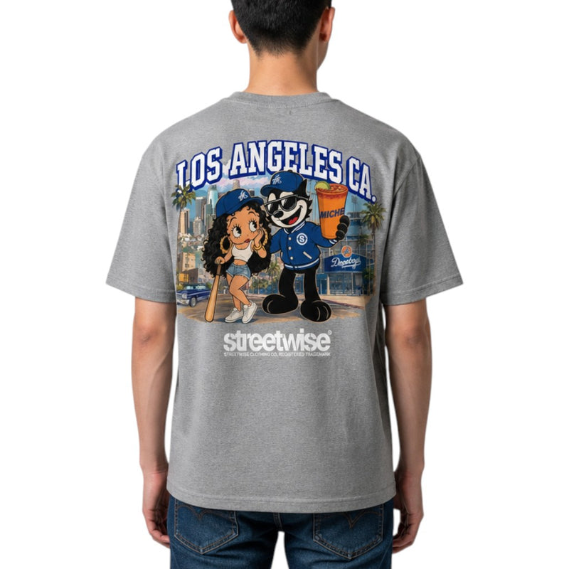 Load image into Gallery viewer, A man shown from the back wearing a heather gray t-shirt with a large Los Angeles cartoon graphic and 'streetwise' branding printed on the back.
