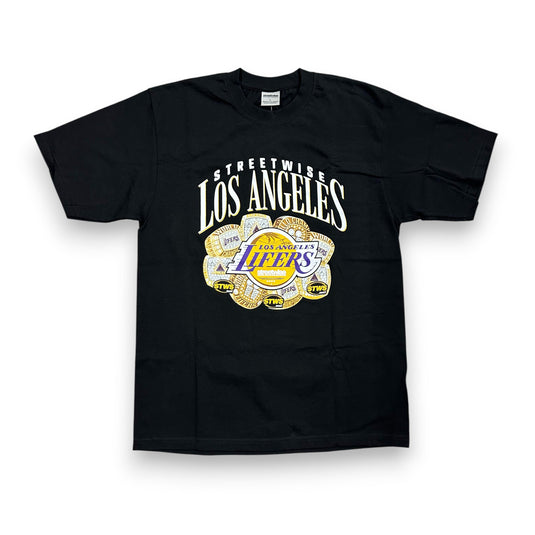Black t-shirt with 'Los Angeles Lakers' logo on a white background