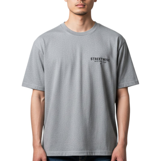 Person wearing a gray t-shirt with 'STREETWISE' text on a white background