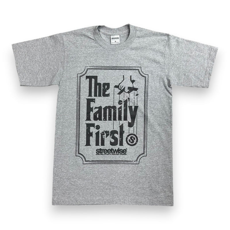Load image into Gallery viewer, A heather gray short-sleeve t-shirt with a black graphic print on the front that reads 'The Family First!' and 'streetwise' underneath, displayed against a plain white background.
