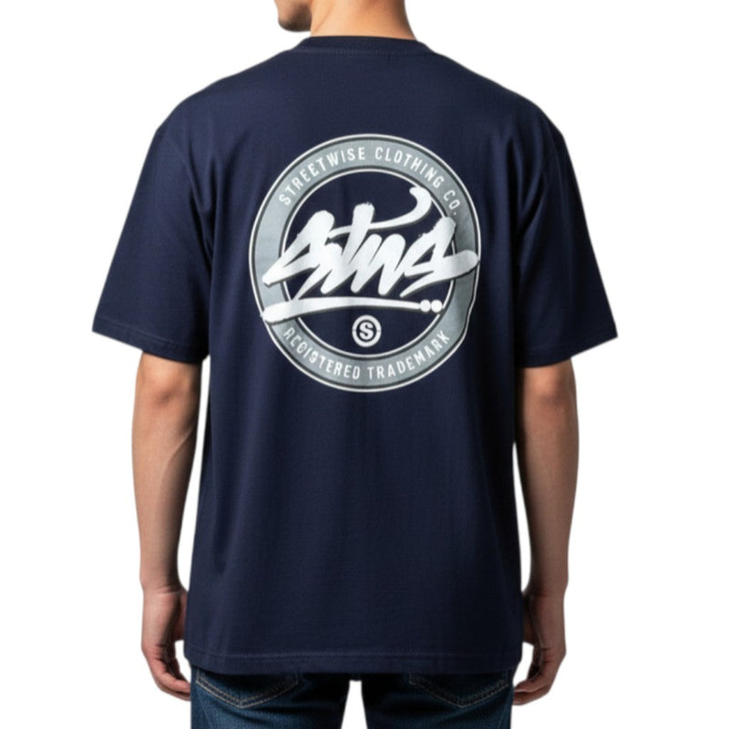 Load image into Gallery viewer, Navy blue t-shirt with a logo on the back, worn by a person.
