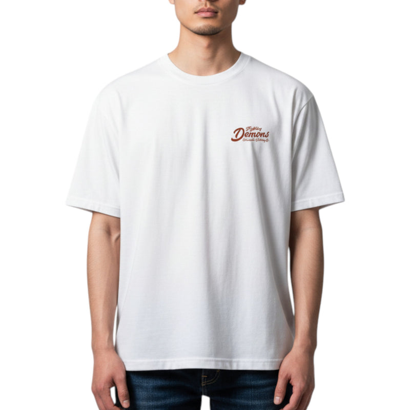 Load image into Gallery viewer, Person wearing a white t-shirt with a logo on the chest against a white background
