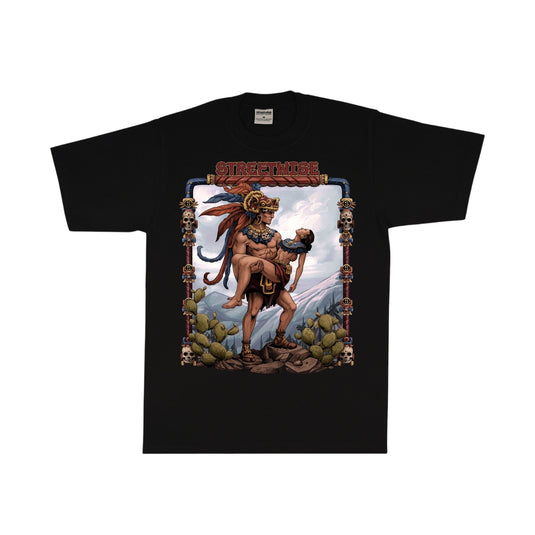 A black short-sleeve graphic t-shirt featuring a detailed front print of a Mexican deity carrying a child, with the text 'Streetwise' above the artwork, displayed on a clean white background.