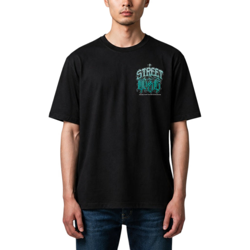 Load image into Gallery viewer, A man wearing a black short-sleeve t-shirt with a teal and white graphic on the left chest that reads 'Streetwise'.
