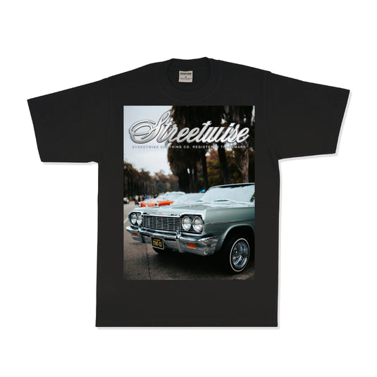 Black t-shirt with a car photo printed on the front on a white background