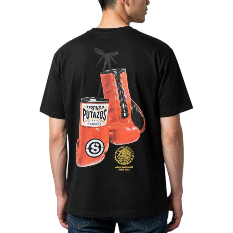 Load image into Gallery viewer, A man wearing a black t-shirt from the back, featuring a large graphic print of red boxing gloves with a gold crest.
