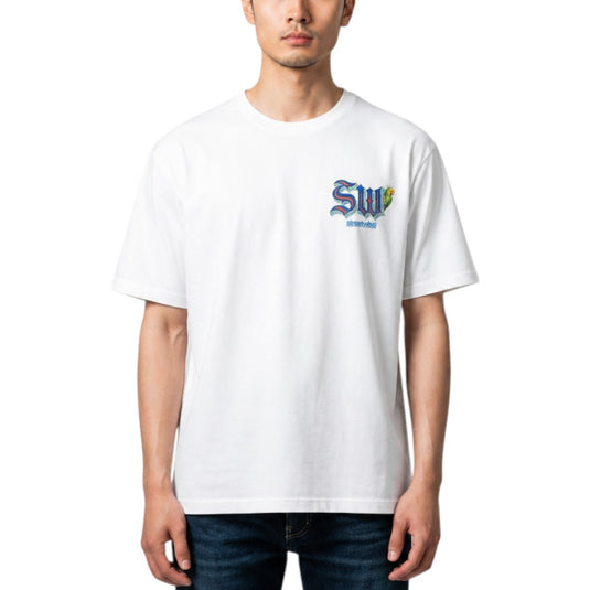 A man wearing a white crew-neck t-shirt with a blue and yellow 'SW' graphic on the left chest, paired with dark blue jeans, against a plain white background.