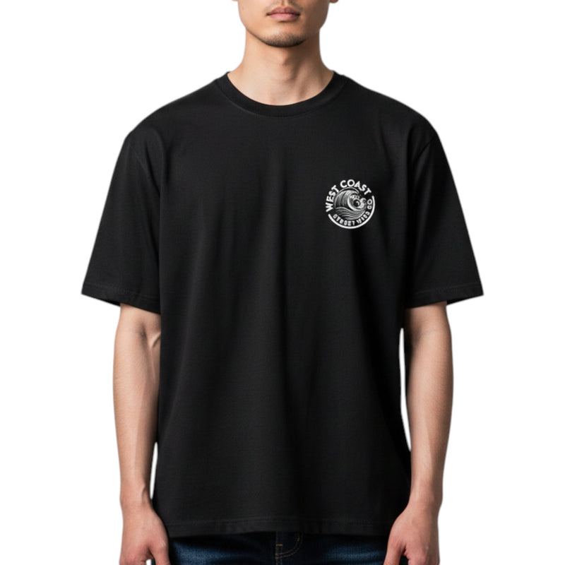 Load image into Gallery viewer, Person wearing a black t-shirt with a logo on the chest against a white background
