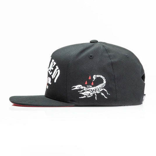 Black cap with white scorpion design and text on a white background