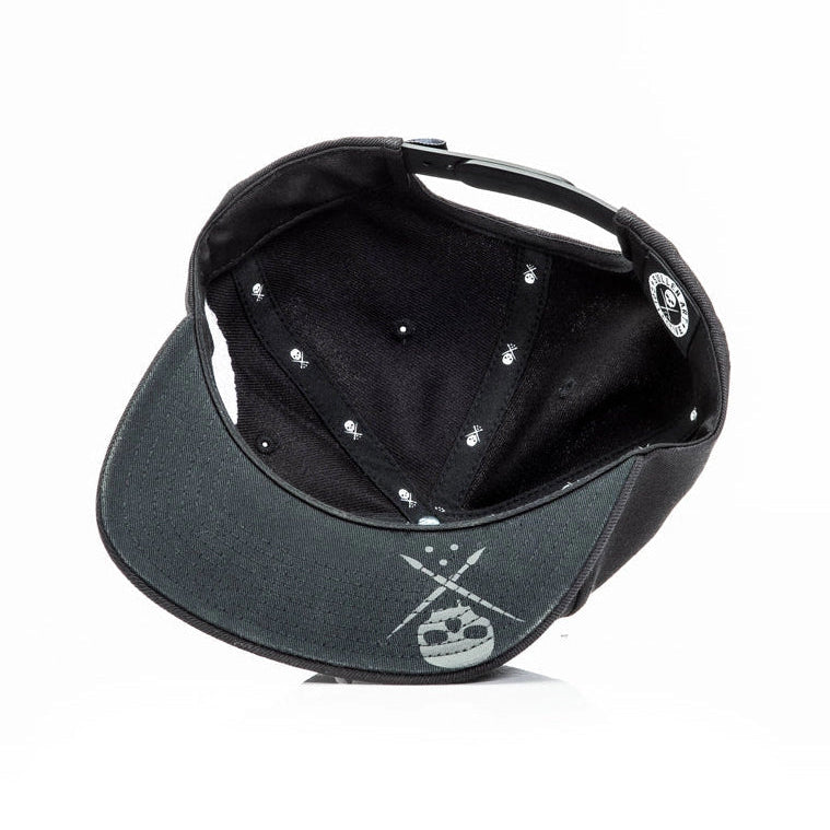Load image into Gallery viewer, Black snapback cap with Sullen logo on the underbrim and inside on a white background

