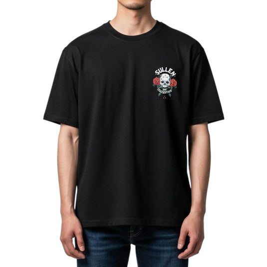 Black t-shirt with skull and roses design and 'Sullen Art Collective' text on a white background