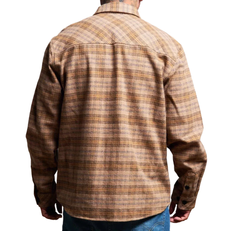 Load image into Gallery viewer, A man viewed from the back wearing a brown and tan plaid button-down shirt jacket, paired with blue jeans, against a plain white background.
