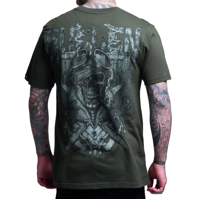 Load image into Gallery viewer, Green t-shirt with a skull and crossbones design on the back, worn by a person with tattoos.
