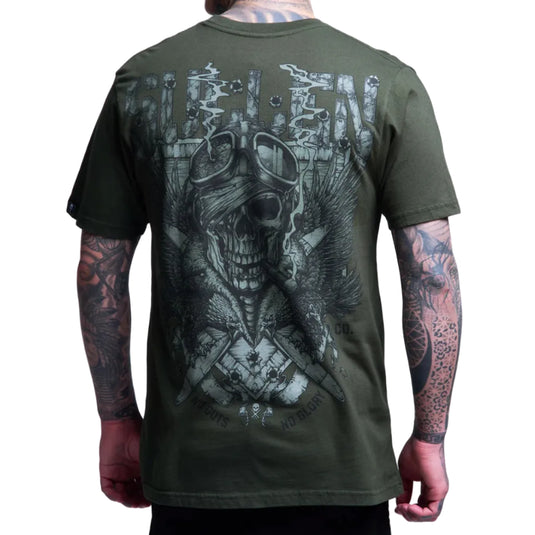 Green t-shirt with a skull and crossbones design on the back, worn by a person with tattoos.