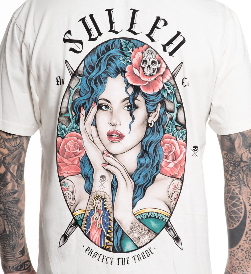 Load image into Gallery viewer, White t-shirt with a colorful graphic of a woman with blue hair and tattoos, featuring the brand 'Sullen'.
