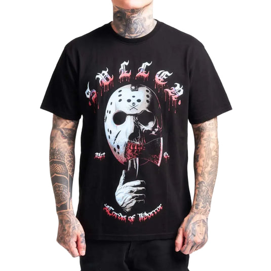A man wearing a black graphic t-shirt featuring a horror-themed design with a hockey mask, dripping red blood, and the text 'Lord of Horror'.