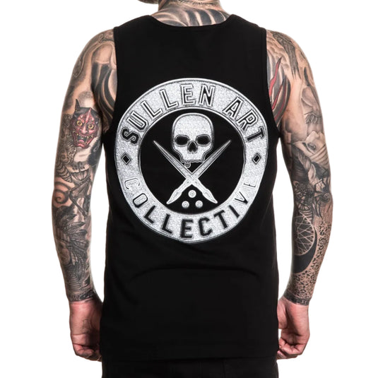 Person wearing a black tank top with 'Sullen Art Collective' logo on the back.