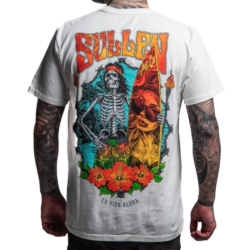 Load image into Gallery viewer, White t-shirt with colorful graphic design featuring a skeleton and flowers, worn by a person.
