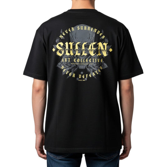 Person wearing a black t-shirt with a skull 'Sullen' logo on a white background