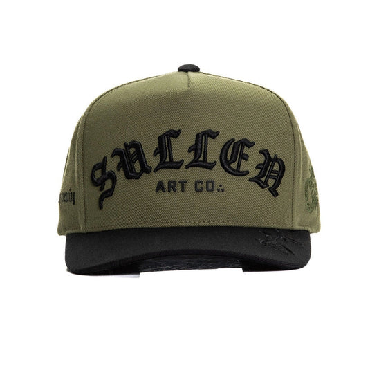 Green cap with 'Sullen Art Co.' logo on a white background