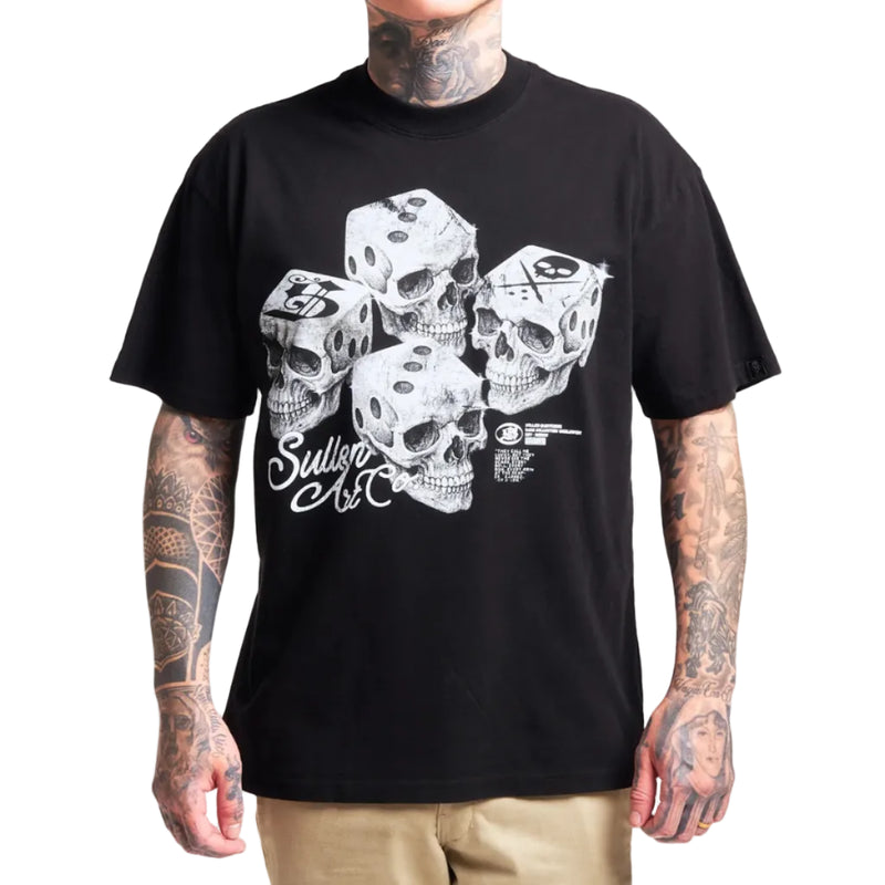 Load image into Gallery viewer, Black t-shirt with white skull design worn by a person with tattoos.
