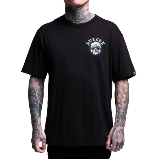 Person wearing a black t-shirt with a logo on a white background