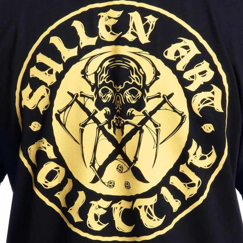 Load image into Gallery viewer, Close-up of a black t-shirt featuring a large circular graphic print in pale yellow. The graphic displays a skull wearing headphones with crossed tools behind it, surrounded by the stylized text 'SULLEN ART COLLECTIVE'

