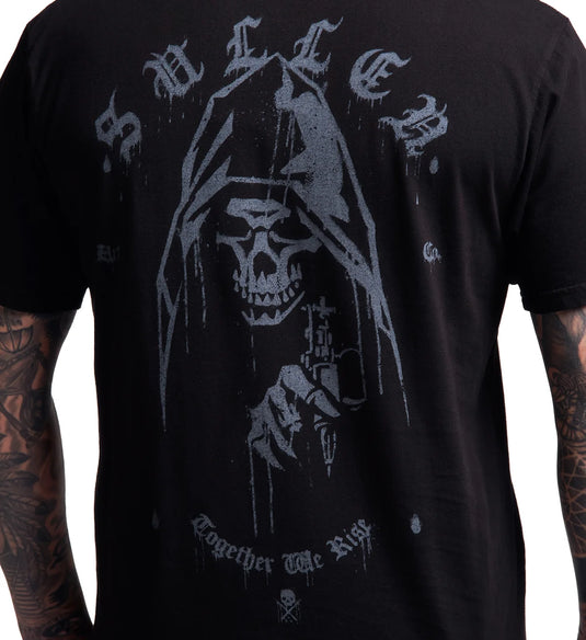 A close-up of a black t-shirt featuring a distressed gray graphic of the Grim Reaper holding a revolver, with the band name 'Sullen' and the text 'Together We Rise' printed on it. The shirt is shown on a model with tattooed arms.