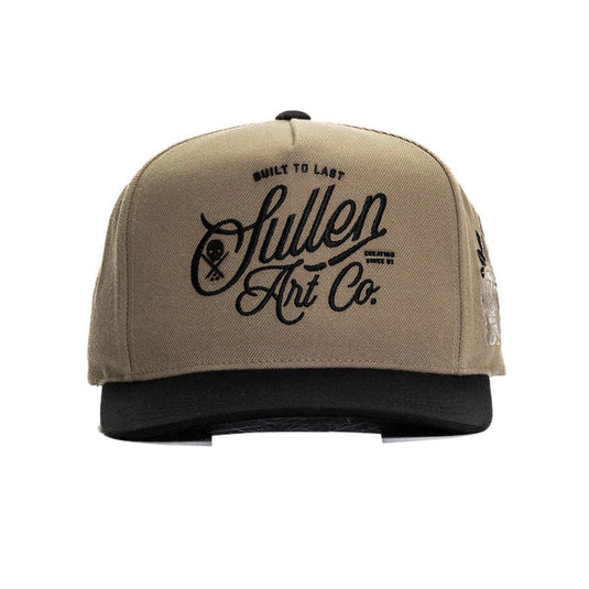 Beige cap with black logo and text on a white background