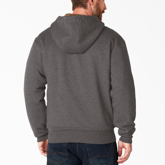 Man wearing a gray hoodie from behind on a white background