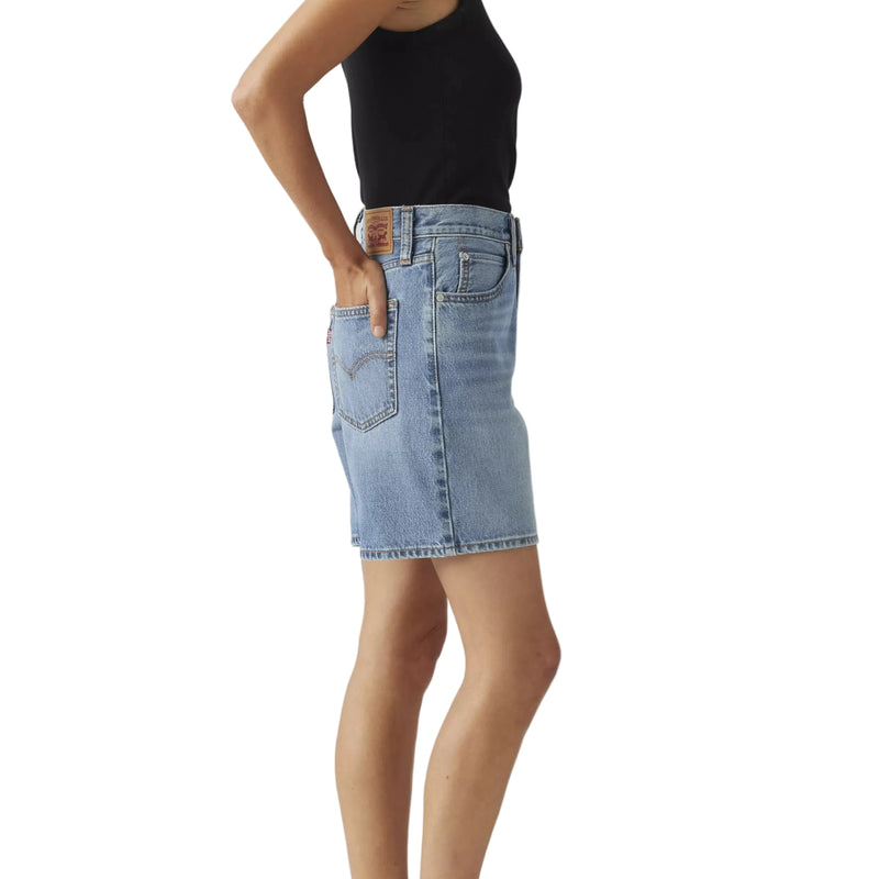 Load image into Gallery viewer, Woman wearing a black tank top and light blue denim skirt on a white background
