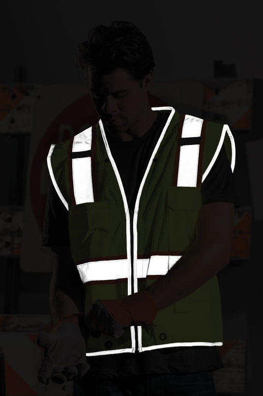 Visual of reflective stipe at night with a person wearing the lime colored Kishigo 1510 vest.
