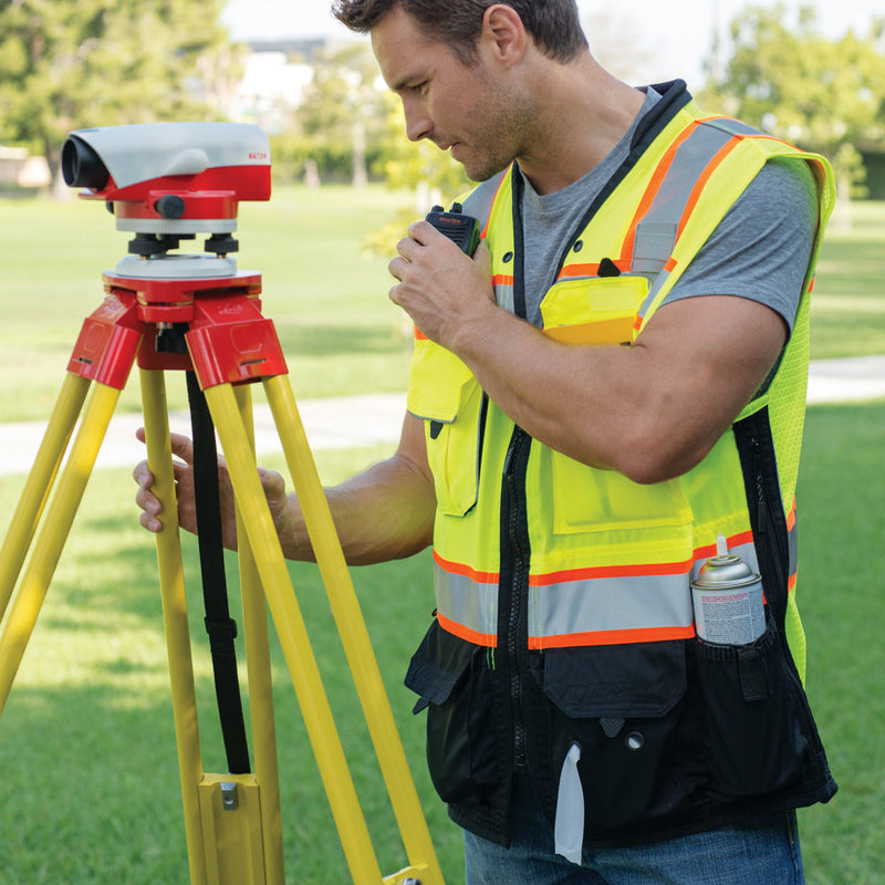 Load image into Gallery viewer, Kishigo S5002 Black Series Surveyor's Vest is a premium solid front with heavy duty bottom and mesh back. The photo is of a person wearing the lime safety vest. 
